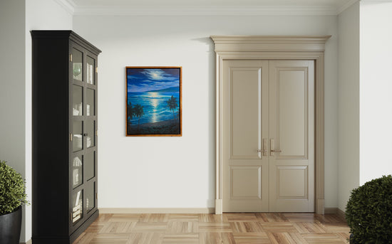 A piece of art hanging on a wall next to a door and a bookcase